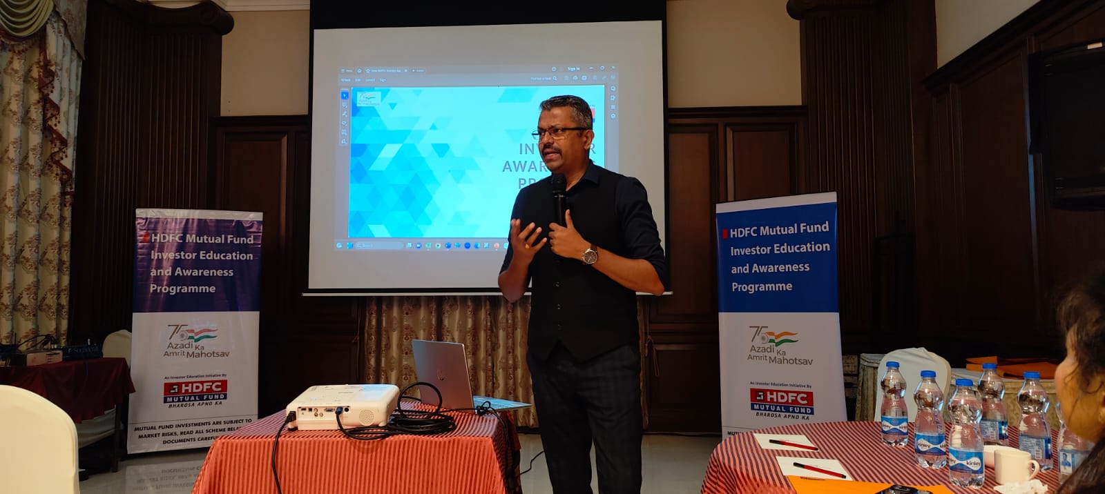Speaker presenting at HDFC Mutual Fund Investor Education and Awareness Programme